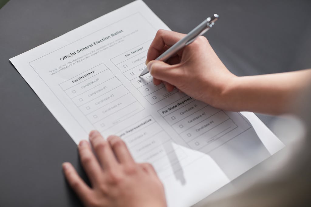 A Peron Filling Up a Voting Ballot